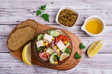 Salad of raw vegetables in oil