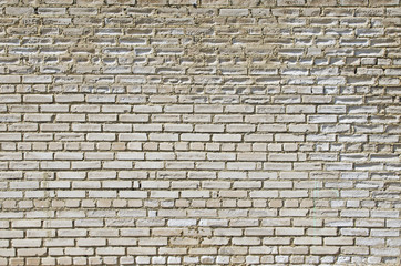 The wall of white silicate brick, which is destroyed by the impact of the fungus and the impact of the environment