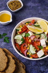 Salad of raw vegetables in oil
