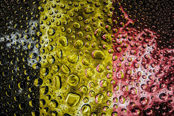 National flag of  Belgium with drops