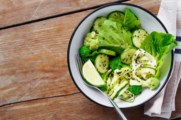 Bowl green salad with copy space top view