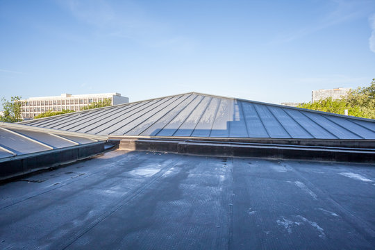 An Flat Roof On A High Building