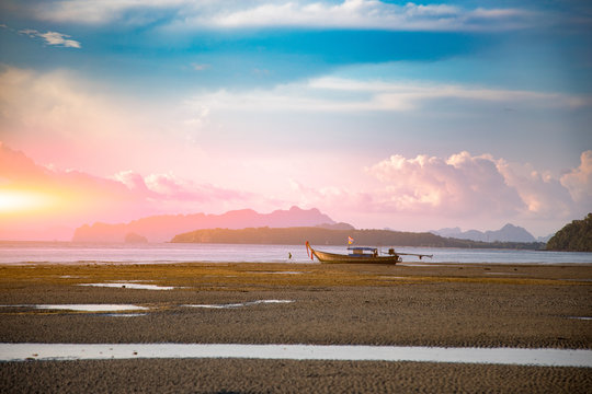 sand beach sunset boat background blue sky white cloud