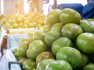 A lot of orange piles in a basket.