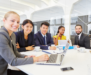 Interracial team in business meeting