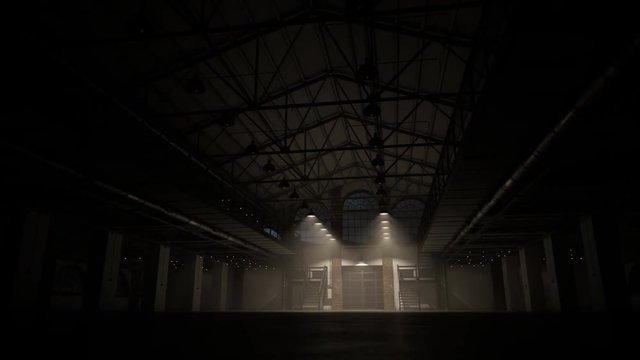 Lights gradually turning on in the large loft hall or warehouse at night.