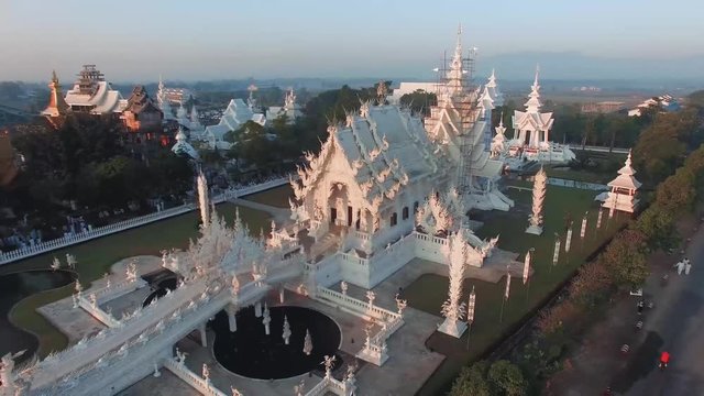 Aerial shot. 3 shots. Around Temple Wat Rog Kuhn (white temple) ,Chiang rai , Thailand in the morning