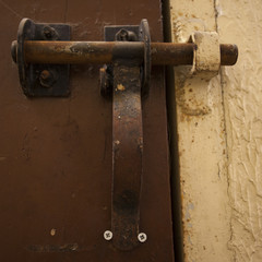 Old gate lock in abandoned jail.
