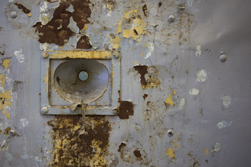 Eyepiece on an old door in abandoned jail