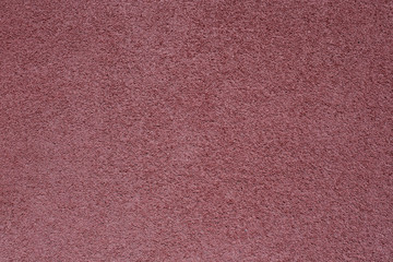 Fototapeta premium Texture of a red treadmill.