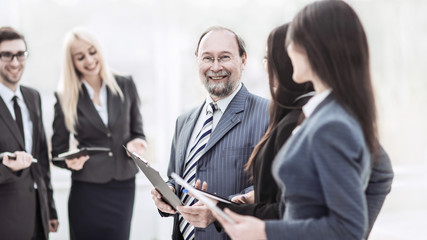 employees discuss their goals before the start of the workshop