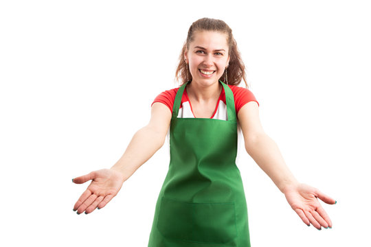 Woman retail or supermarket worker making welcome gesture