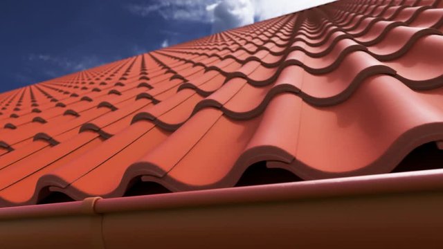 Animation of a house with the red clay tiled roof on a clear sky at background.