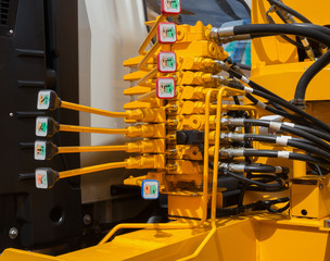  Tubes fittings and levers on control panel of lifting mechanism