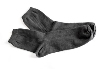 Black new men's socks on a white isolated background_