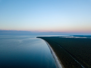 drone image. aerial view of red sunset in the sea. shore line