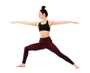 Beautiful woman practicing yoga on white background