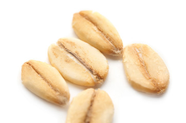 Raw oatmeal on white background, closeup
