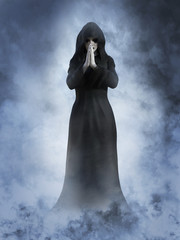 3D rendering of a ghost nun praying. - obrazy, fototapety, plakaty