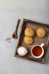 Tea with Sugar and Chocolate Chip Cookies. Served in a Wooden Tray.