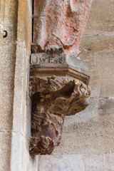 madonna figure on ancient church wall © rudolfgeiger