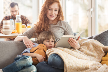 A mother reading a book