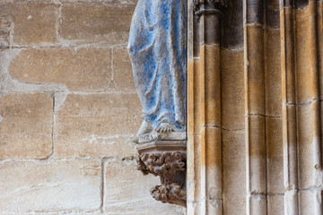 madonna figure on ancient church wall © rudolfgeiger