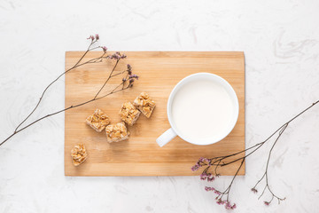 Milk glass on wooden table. Healthy eating concept