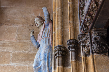 madonna figure on ancient church wall