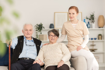 Portrait of caregiver with seniors
