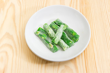 Turkish delight flavored with mint on the white saucer