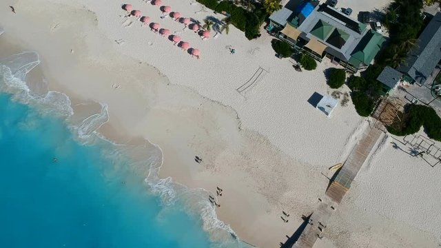Drone aerial view of resort and pier in Grace Bay, Providenciales, Turks and Caicos