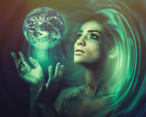 Blue Earth in her hands. Birth of a new universe. Fantastic female portrait