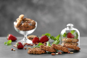 Delicious oatmeal cookies on table