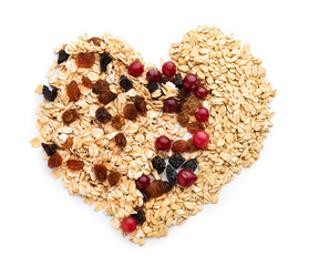 Composition with raw oatmeal, raisins and cranberries on white background