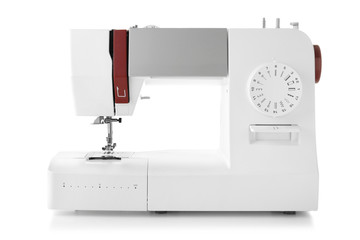 Modern sewing machine on white background