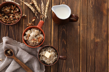 Obraz na płótnie Canvas Composition with tasty oatmeal on wooden table