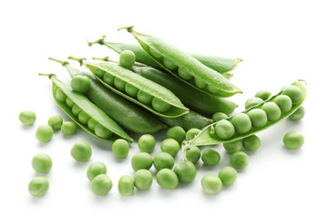 Pods with fresh green peas on white background