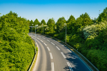 Fototapeta premium Beautiful road. country road with white lines