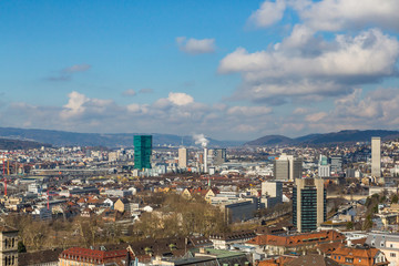 roofs of zurich, blue sky, white clouds