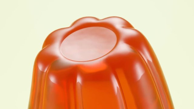 Seamless animation of single orange flavour jelly shaking. Tasty Jello dessert.