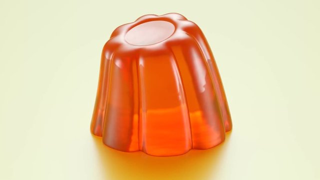 Seamless animation of single orange flavour jelly shaking. Tasty Jello dessert.