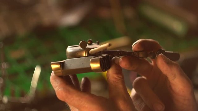 old vinatge model tank in hand man