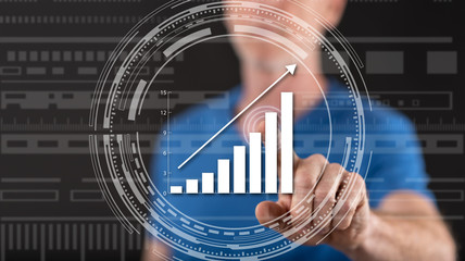 Man touching a financial growth concept