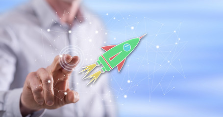 Man touching a startup concept