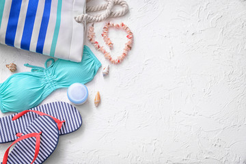 Composition with beach items on white background