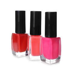 Obraz premium Bottles of colorful nail polishes on white background