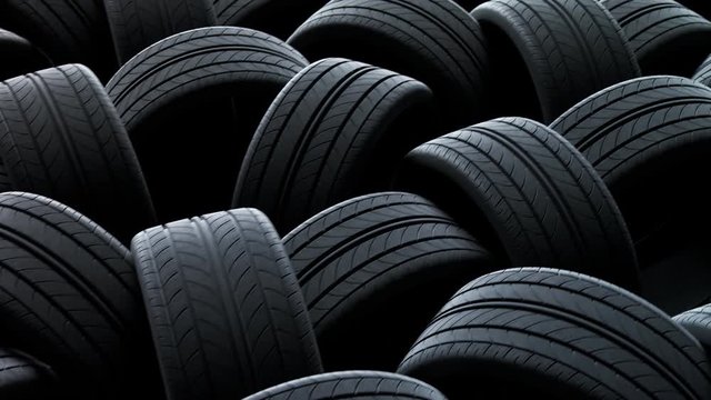 Endless chaotic stack of new tires. Automotive modern manufacturing rubber.