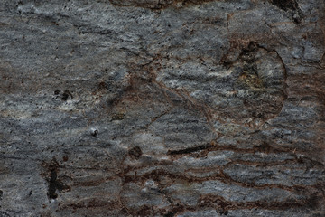 Dark stones texture pattern nature background.