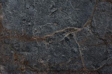 Dark stones texture pattern nature background.